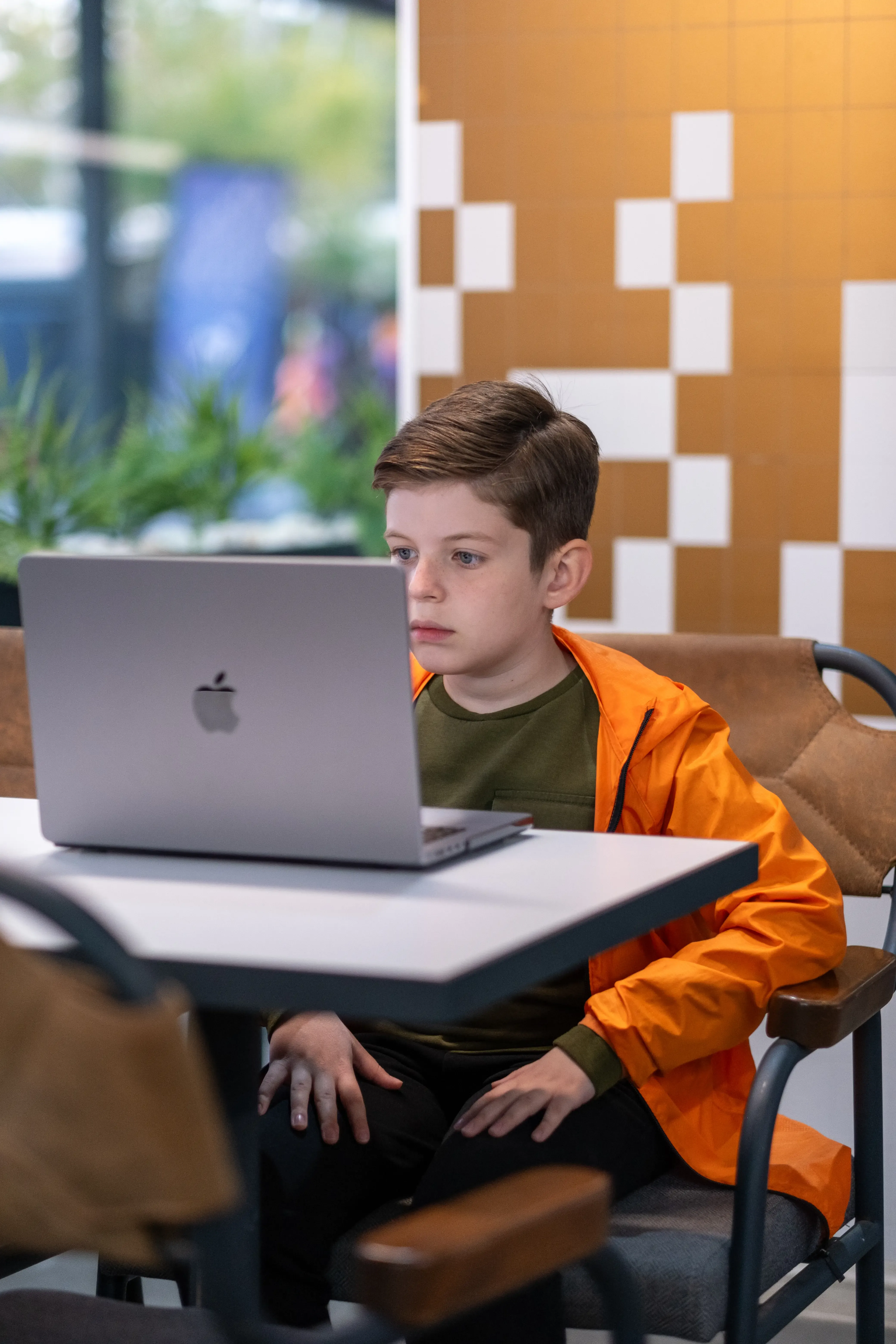 Child working with instructor