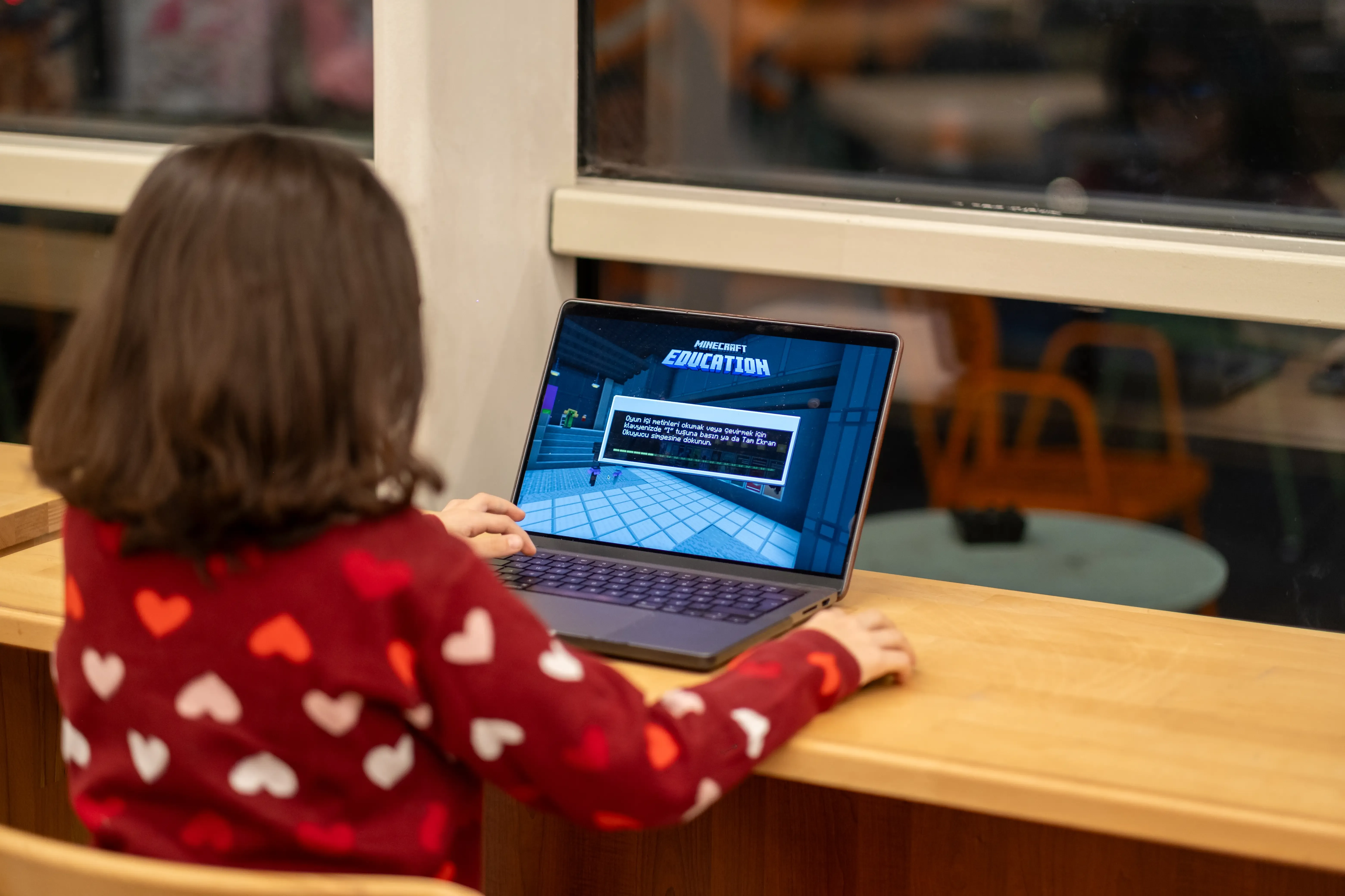 Kids building a Minecraft project